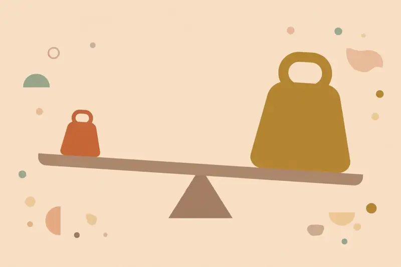A seesaw balancing a small deductible weight against a large premium weight
